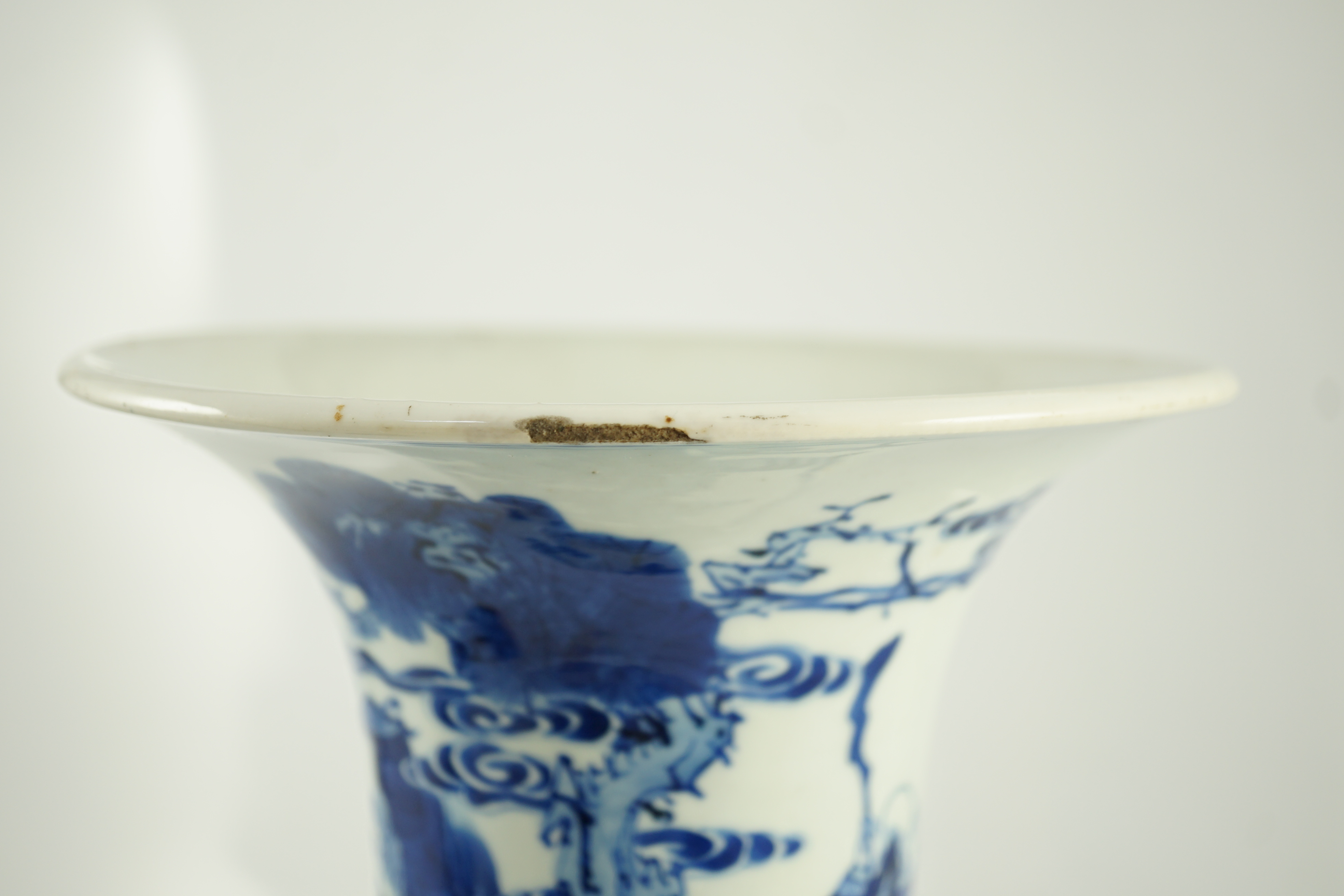 A Chinese blue and white ‘Daoist immortals’ yen-yen vase, Kangxi period, glaze losses to rim and edge of foot